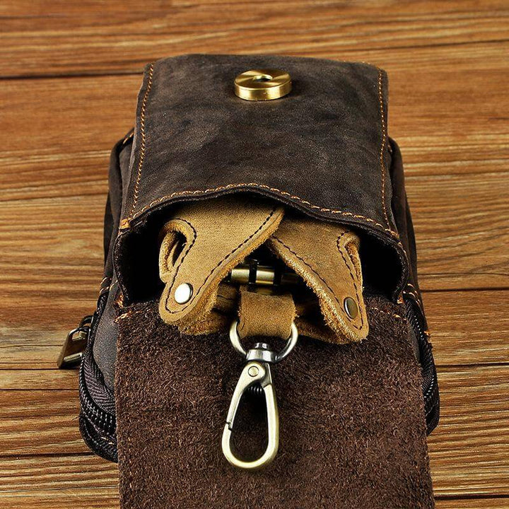 Rugged men's dark brown waist bag, premium multi-pocket fanny pack for secure, durable everyday carry.
