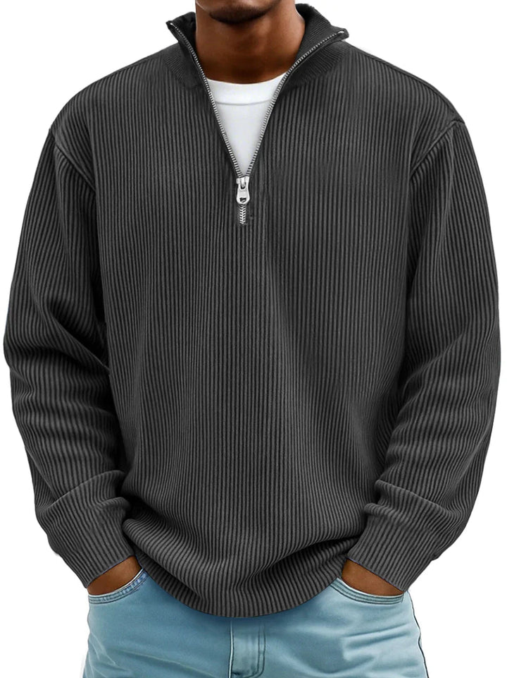 Effortless men's half-zip ribbed sweater. Ideal for stylish casual outfits and winter layering.
