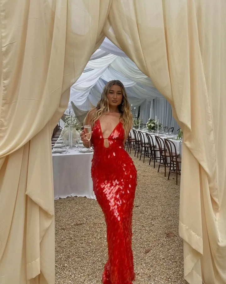 Shimmering red sequin formal dress, perfect for proms, homecoming, or special events.