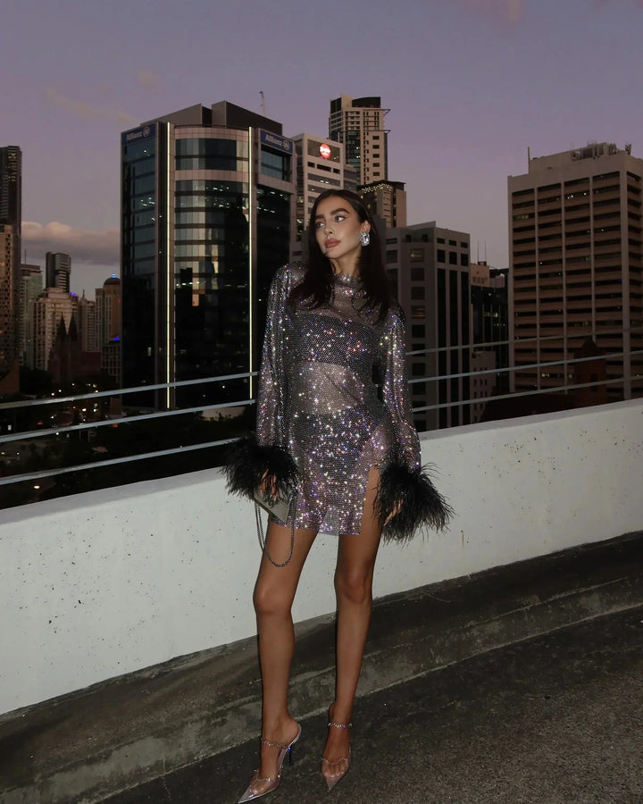 Shimmering women's long sleeve party mini dress, ideal for night outs, formal events, and evening wear.