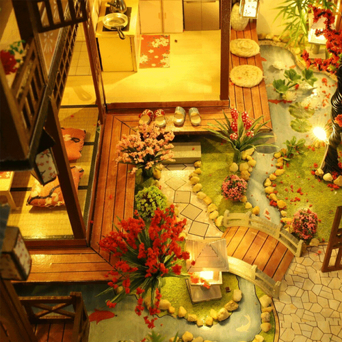 Engaging DIY miniature wooden dollhouse craft project with LED lights, perfect for model building hobbyists.