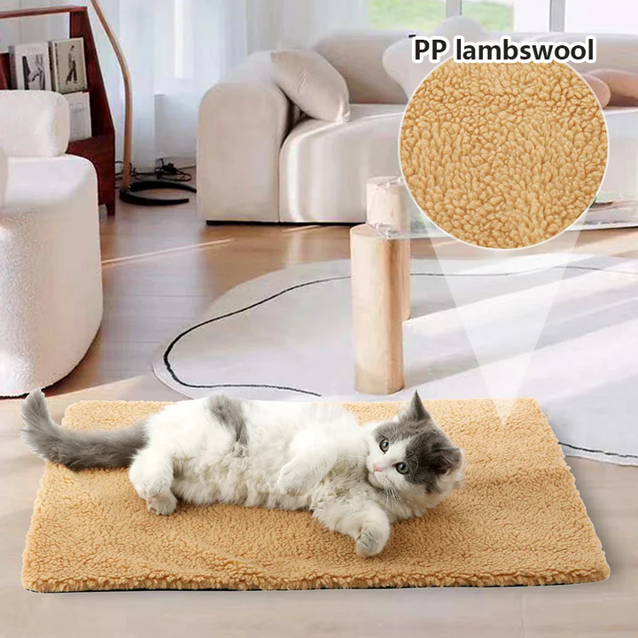 Soft, washable self-warming pet mat for dogs & cats. Non-electric heating pad provides lasting warmth.