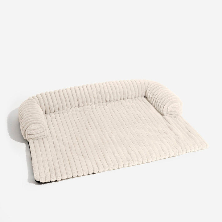 Versatile pet sofa cover & dog lounge mat. A fluffy, non-slip furniture protector ensuring pet comfort & clean sofas.