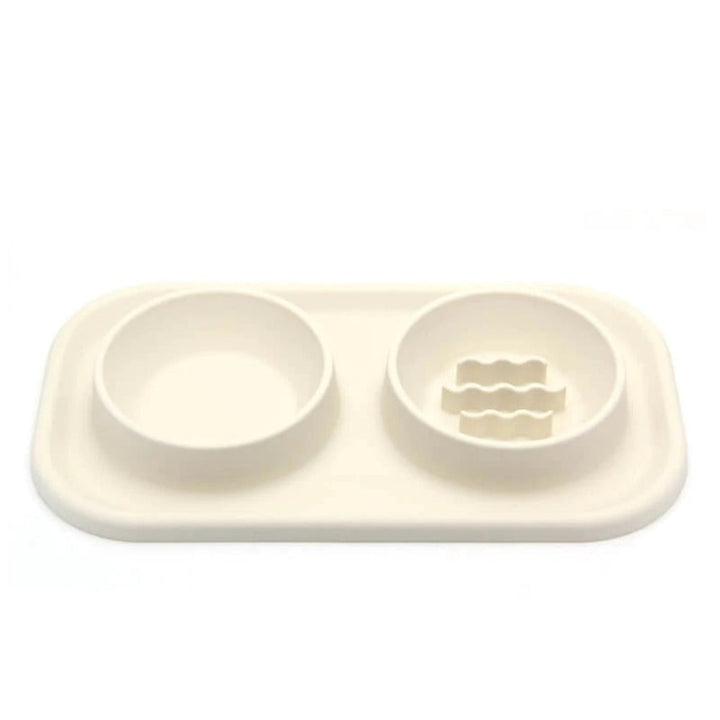 Non-slip silicone & stainless steel dual pet bowl. Anti-gulp slow feeder for improved dog & cat digestive health.