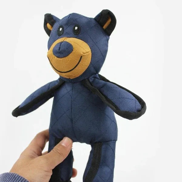Interactive bear dog toy with squeaker. Durable and tough for aggressive chewers; a chew-resistant pet supply.
