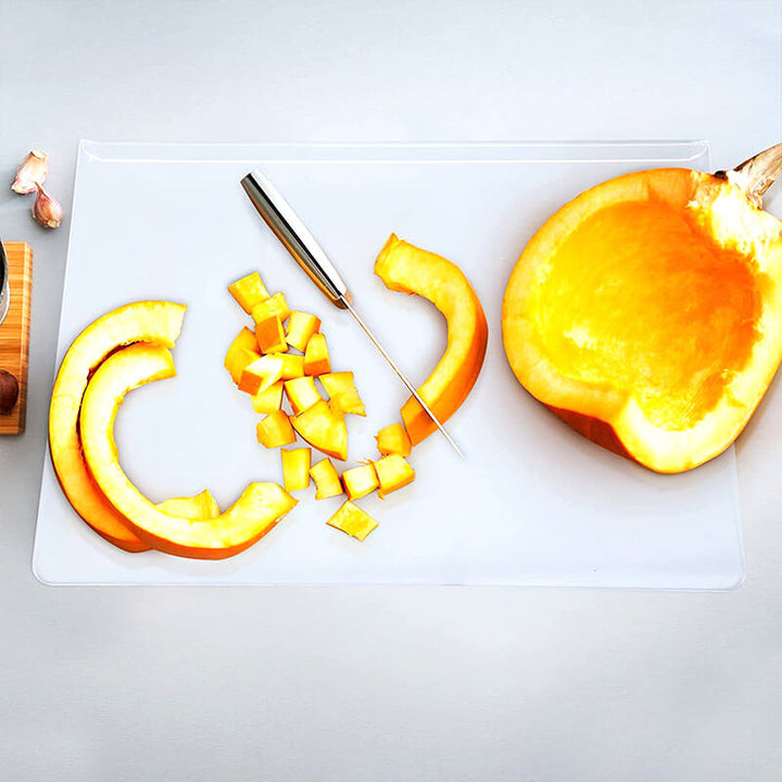 Clear acrylic non-slip cutting board, ensuring stability and safety during all kitchen food prep.