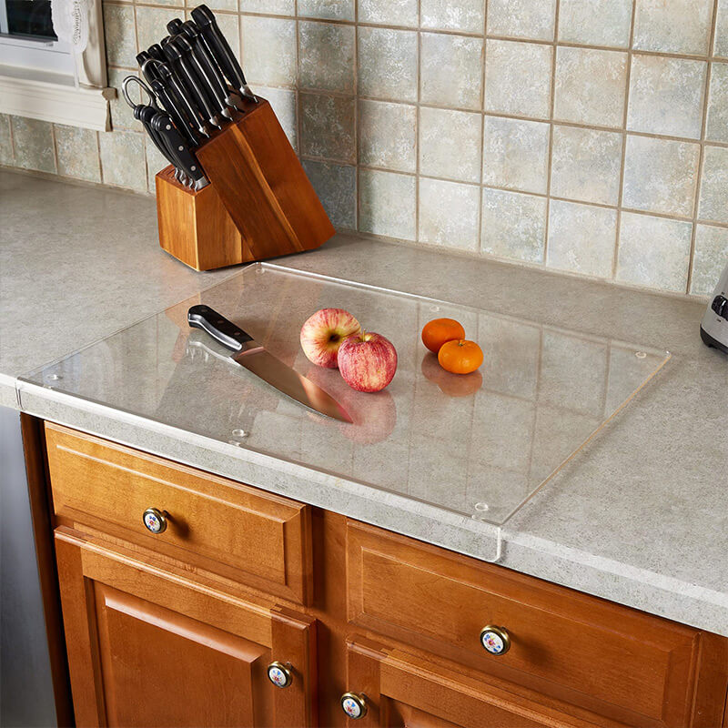 Essential non-slip acrylic cutting board for efficient and safe kitchen food prep and precise slicing.