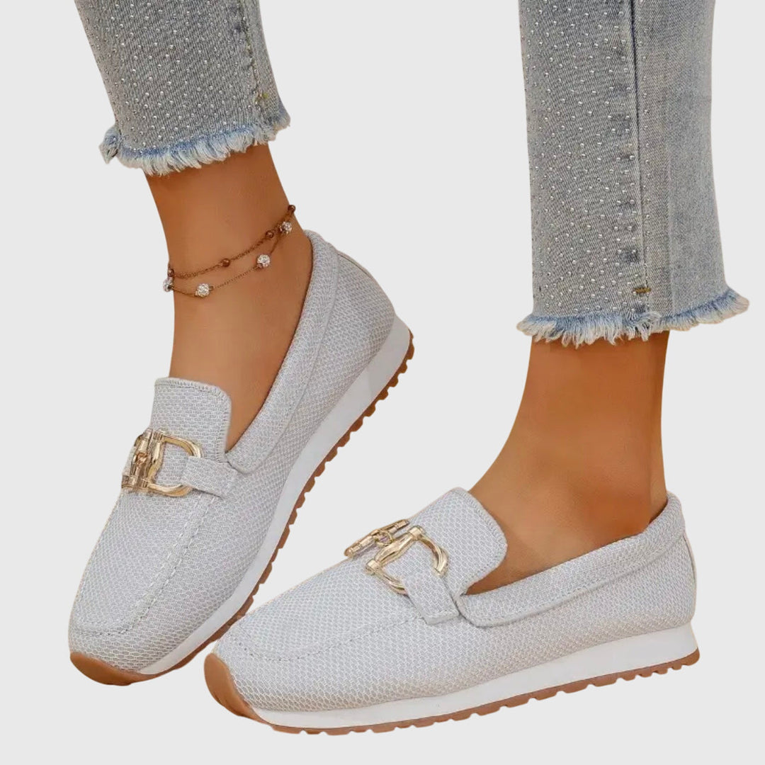 Elegant dusty blue women's loafers with gold horsebit accent. Perfect for comfortable, chic everyday fashion.