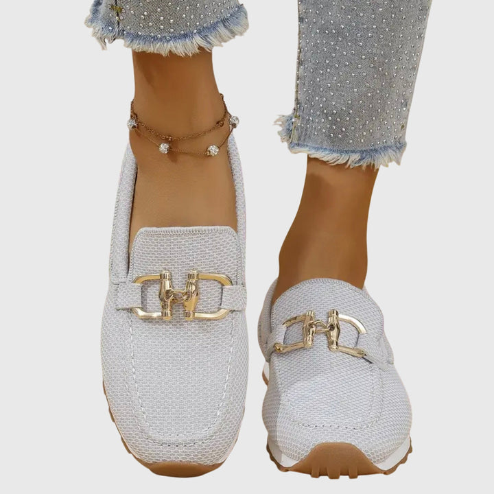 Fashionable dusty blue women's loafers with a distinctive horsebit detail. Great for comfortable casual style.