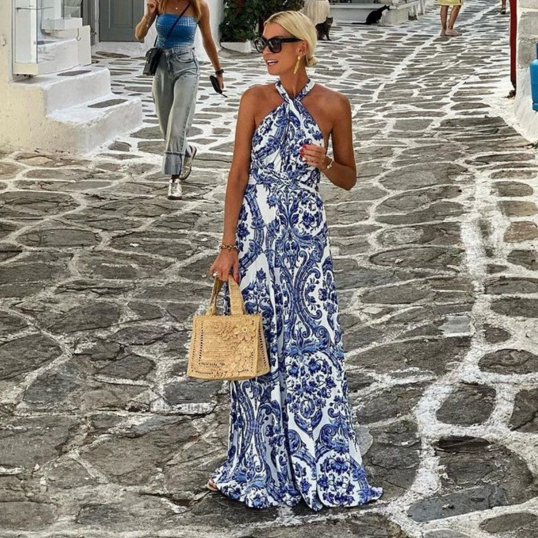 Graceful women's halter maxi dress, a stylish and comfortable A-line sundress ideal for elegant summer events.