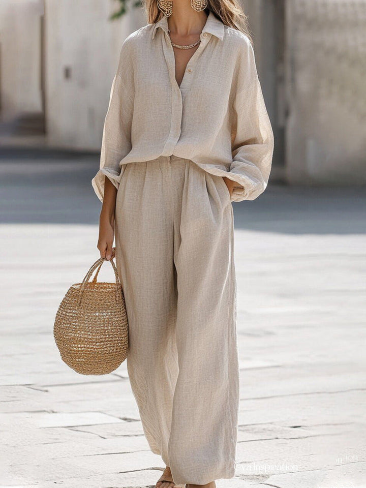 Relaxed fit women's two-piece blouse and pants set. Ideal for comfortable summer fashion & casual wear.