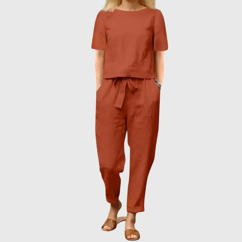 Trendy women's crop top & flowy belted trousers set, an effortlessly chic two-piece ensemble for summer.