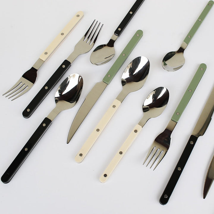 Durable 24-piece engraved stainless steel cutlery set for everyday meals & special dining occasions.