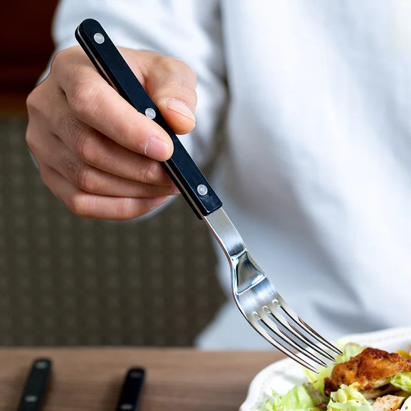 Luxury 24-piece engraved stainless steel flatware, a beautiful and functional addition to your dining table.