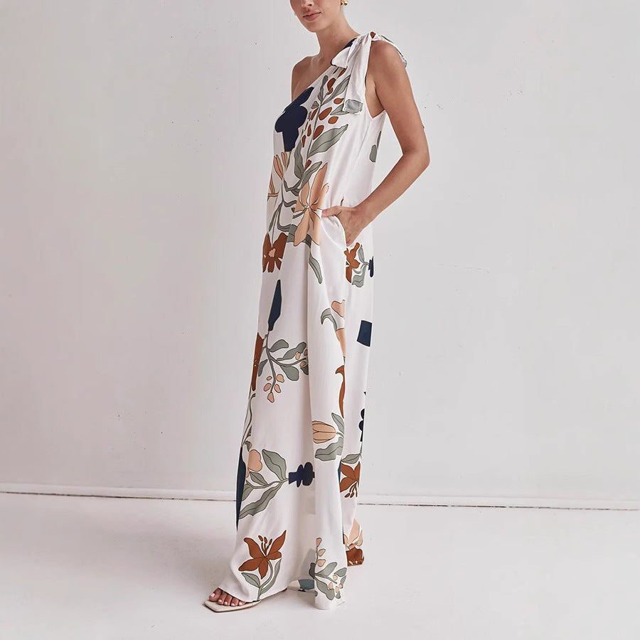 Comfortable women's one-shoulder floral maxi dress in apricot, perfect for parties, casual outings, or evenings.
