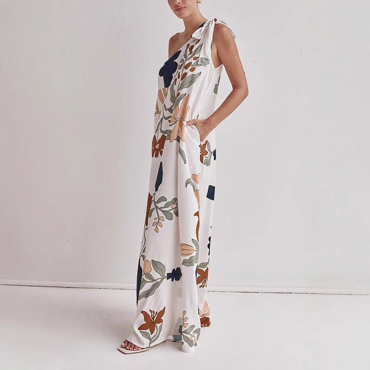 Comfortable women's one-shoulder floral maxi dress in apricot, perfect for parties, casual outings, or evenings.