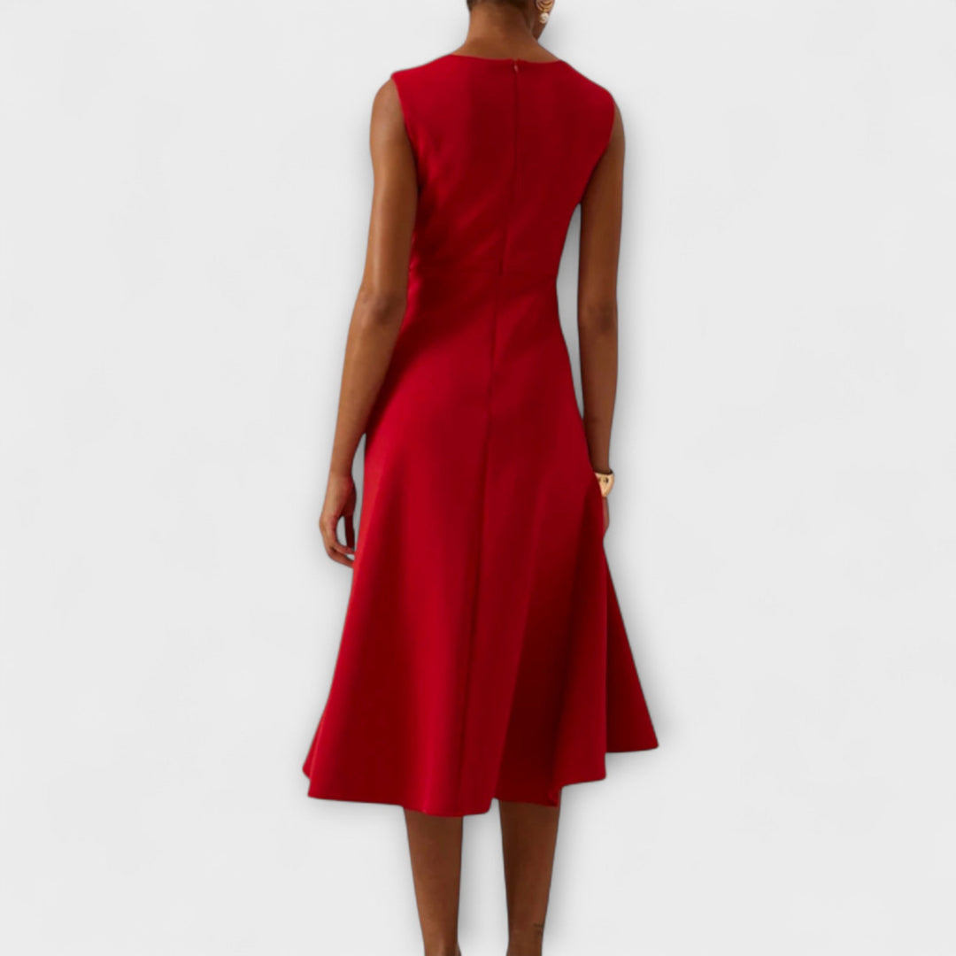 Women's sleeveless asymmetric midi dress, ideal elegant party or cocktail attire.