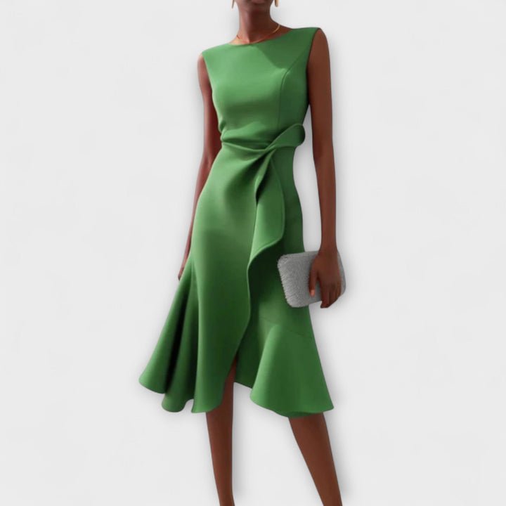 Fashionable asymmetric midi dress for women, offering an elegant look for evening or party wear.
