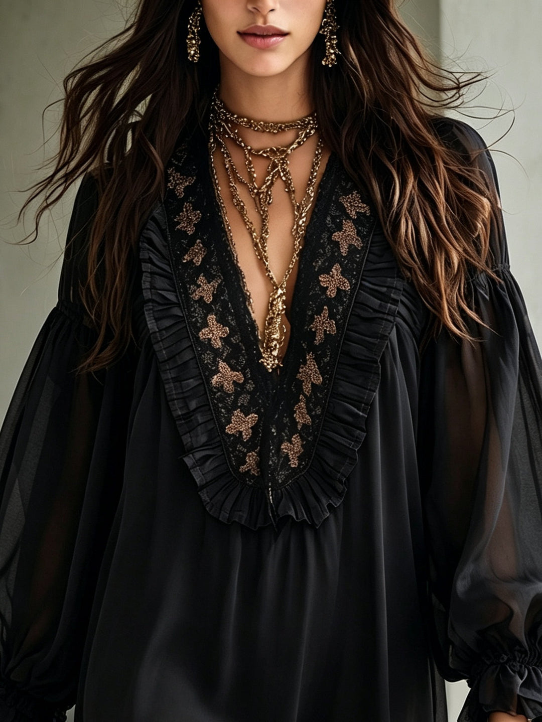 Boho black mini dress for women with a deep V-neck & balloon sleeves, a stylish date night or evening wear choice.