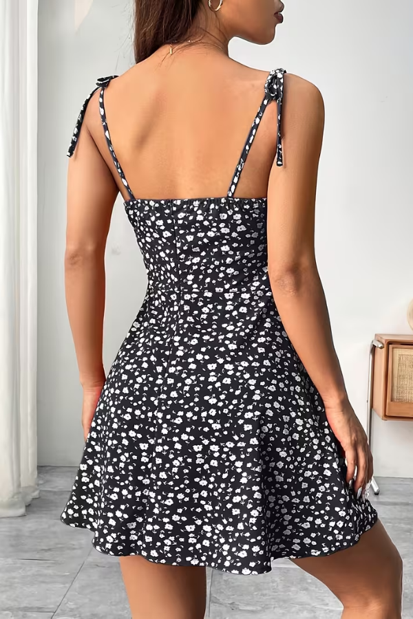 Women's green floral strapless slip dress. Lightweight and elegant for summer fashion, versatile for date night or brunch.