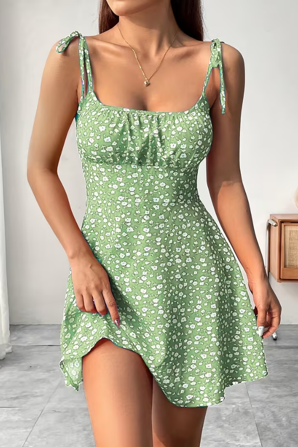 Stylish pink floral strapless slip dress. Effortless women's summer fashion, ideal for a comfortable yet elegant brunch or date.