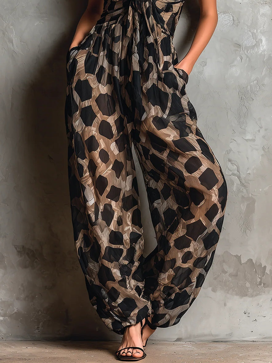Flowy black leopard print maxi dress for women, elegant V-neck wrap style, a perfect choice for resort wear.