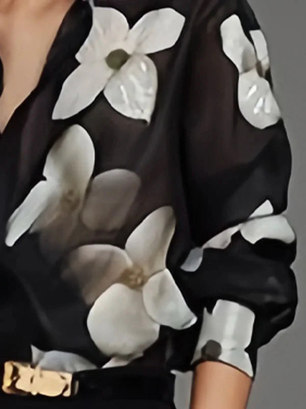 Stylish black long-sleeve women's top. An elegant & comfortable blouse for office, work, or any versatile fashion occasion.