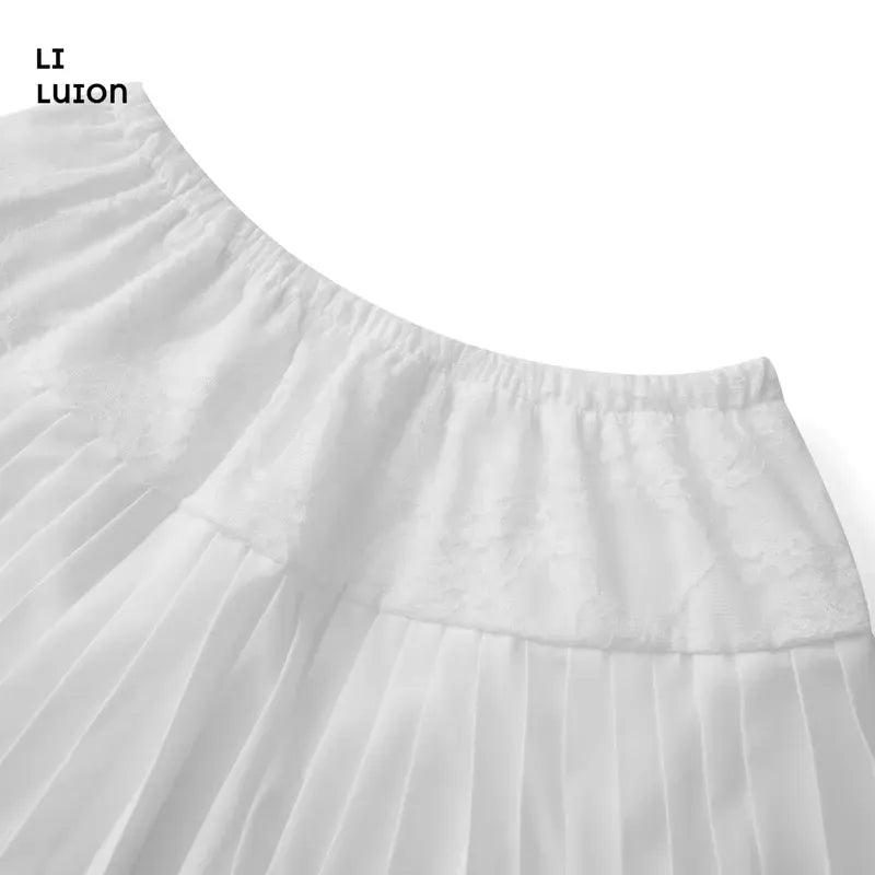 Close-up of a women's pleated mini skirt, showcasing the intricate lace trim and fabric texture
