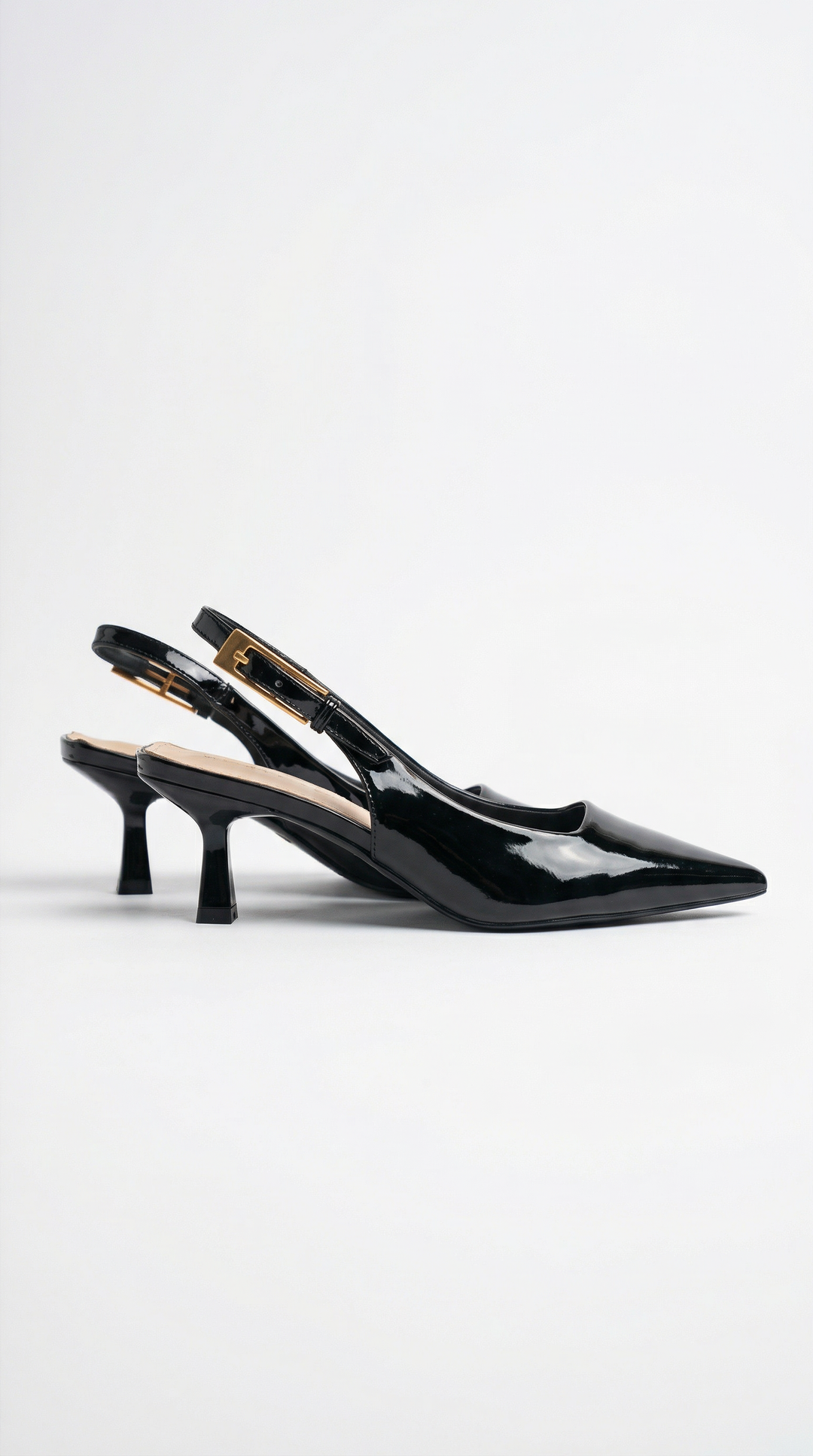 Chic women's pointed toe slingback pumps with a comfortable kitten heel.
