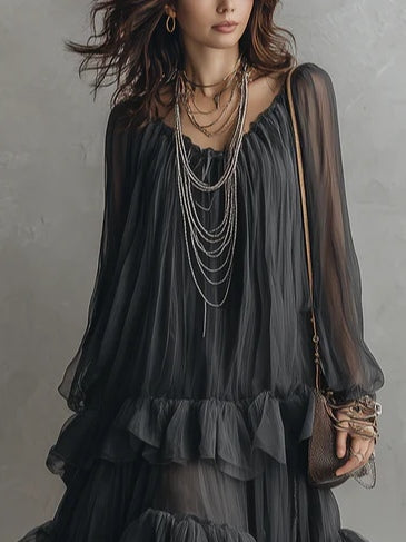 Flowing women's black tiered ruffle maxi dress with V-neck, ideal for summer, boho chic, or casual elegance.
