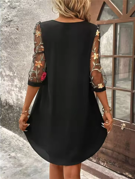 Versatile women's black V-neck dress with sophisticated sheer floral long sleeves. Ideal for elegant party & occasion wear.