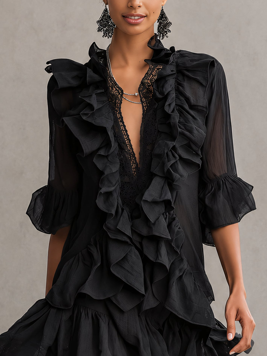 Elegant black ruffle mini dress with V-neck and sheer sleeves, a perfect choice for special occasions & evening wear.