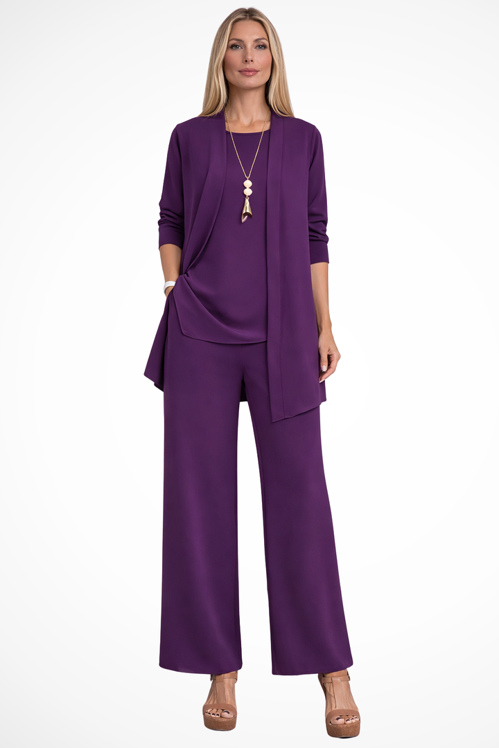Woman confidently posing in a smart formal 3-piece outfit, suitable for business and parties.