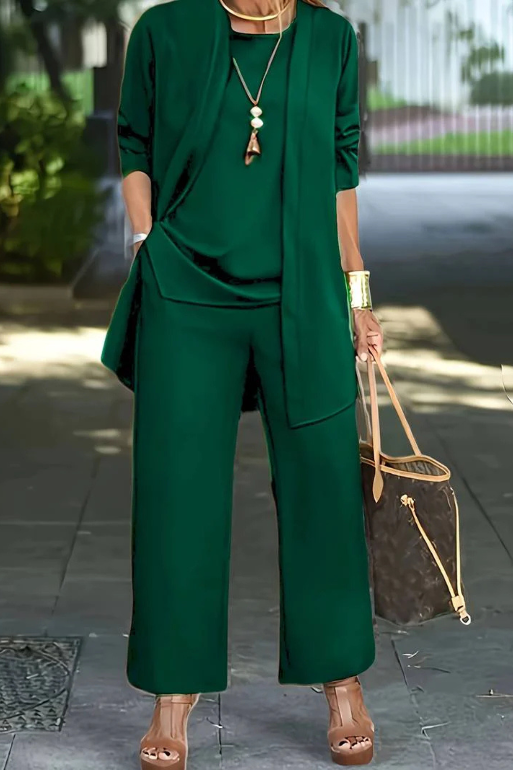 Sophisticated women's 3-piece ensemble, perfect for making a statement at any special occasion.