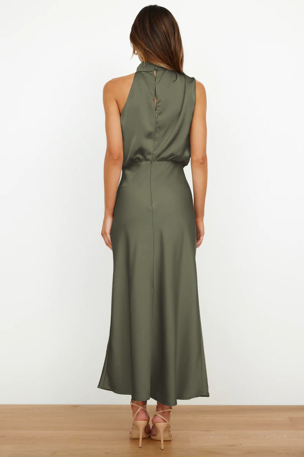 Fashionable women's halter evening wear, open back, floor-length, perfect for parties.