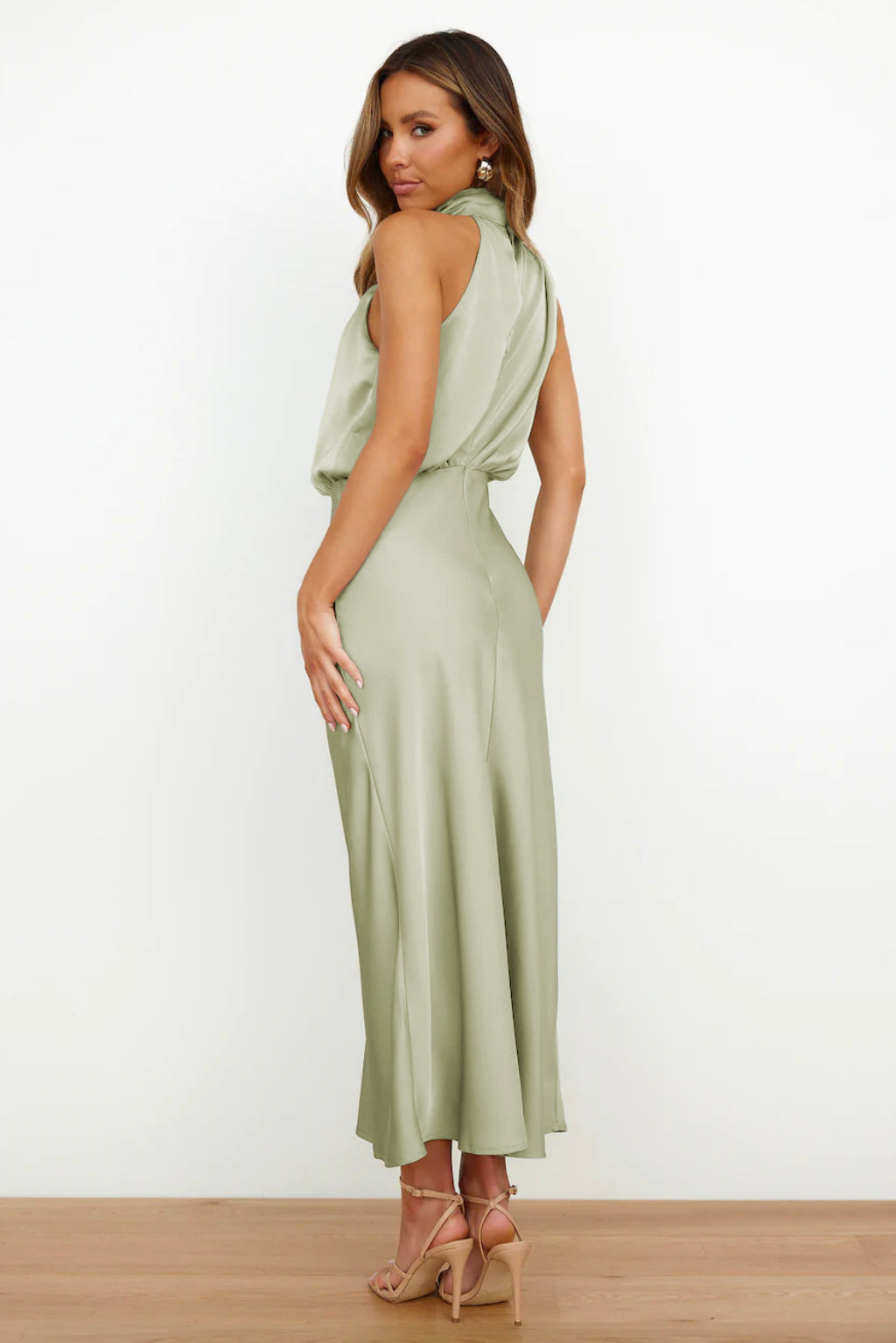 Floor-length elegant halter party dress for women, featuring a stunning open back design.