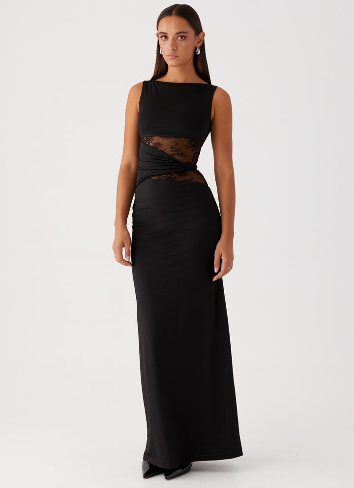 Elegant black women's maxi dress with lace cut-out, boat neck, & sleeveless design, perfect for formal evening wear.