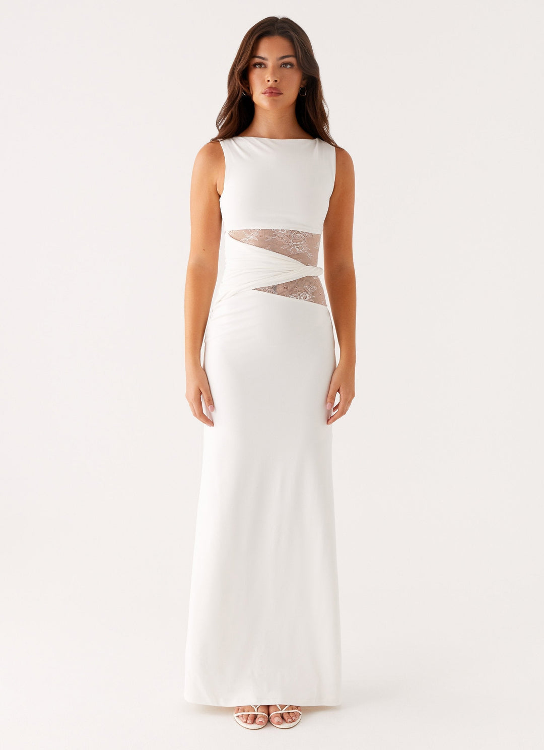 White sleeveless party maxi dress for women, elegant boat neck gown with beautiful lace cut-out accents.