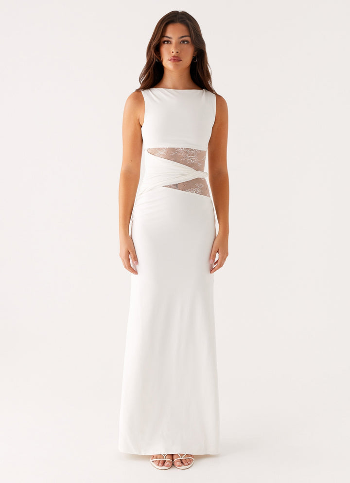 White sleeveless party maxi dress for women, elegant boat neck gown with beautiful lace cut-out accents.