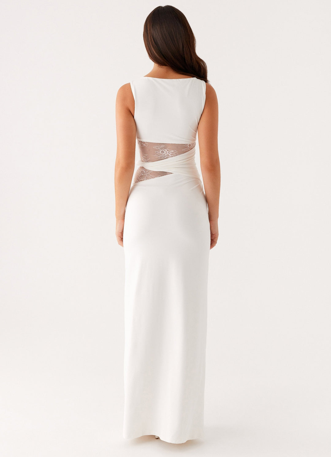 Women's formal gown, a sleek sleeveless maxi dress with a boat neck and intricate lace cut-outs for evenings.