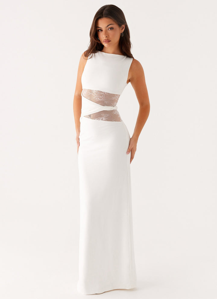 Elegant women's sleeveless maxi dress with a boat neck and delicate lace cut-out, suitable for formal events.