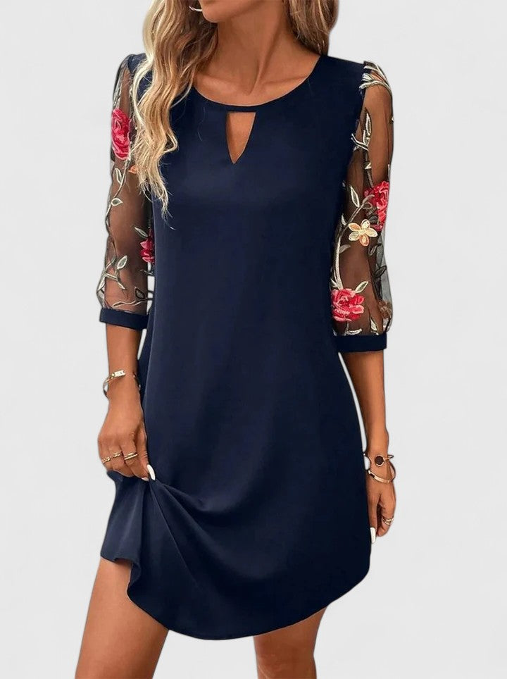 Elegant black women's summer dress for sophisticated party wear & wedding guests. Versatile special occasion outfit.