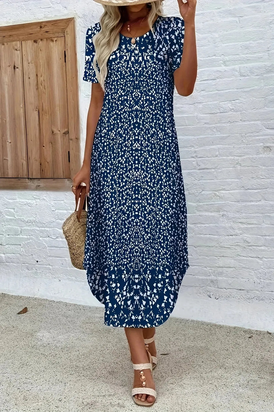 Blue elegant floral print maxi dress with a comfortable fit, suitable for summer and special occasions.