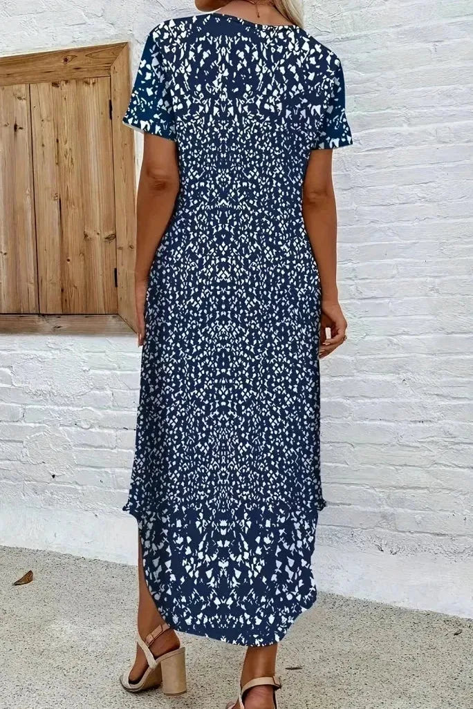 Chic women's blue floral maxi dress, versatile for summer daywear or elegant evening events.