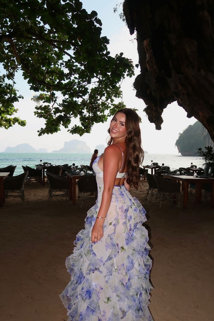 Fashionable blue floral corset maxi dress with delicate ruffles, a perfect elegant party or date night outfit.