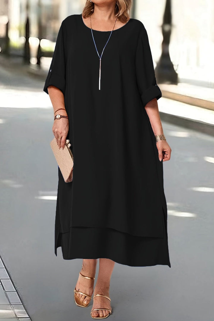 Sophisticated women's black long dress, graceful flowing style, ideal for evening gowns & special occasion fashion.
