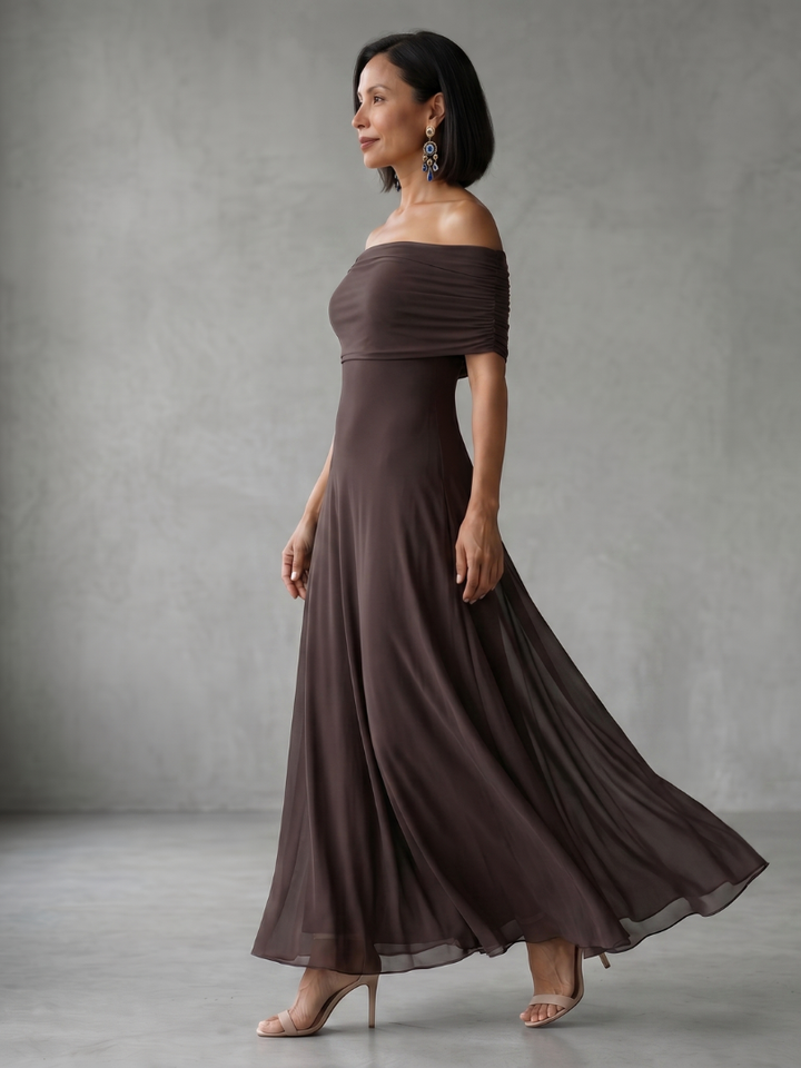 Women's coral pink off-shoulder midi dress featuring a chic draped bodice, ideal for cocktail parties.