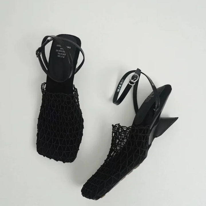 Close-up of the square toe and mesh detail on women's black elegant comfortable heels
