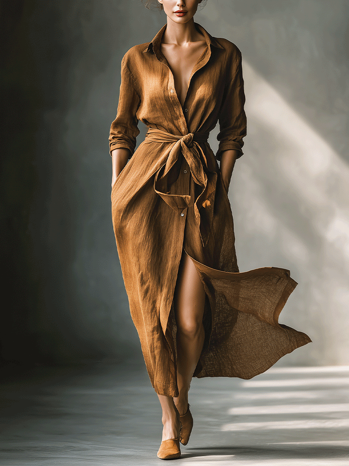 Elegant brown women's maxi shirt dress with tie-waist & V-neck. Perfect long-sleeve fall fashion.