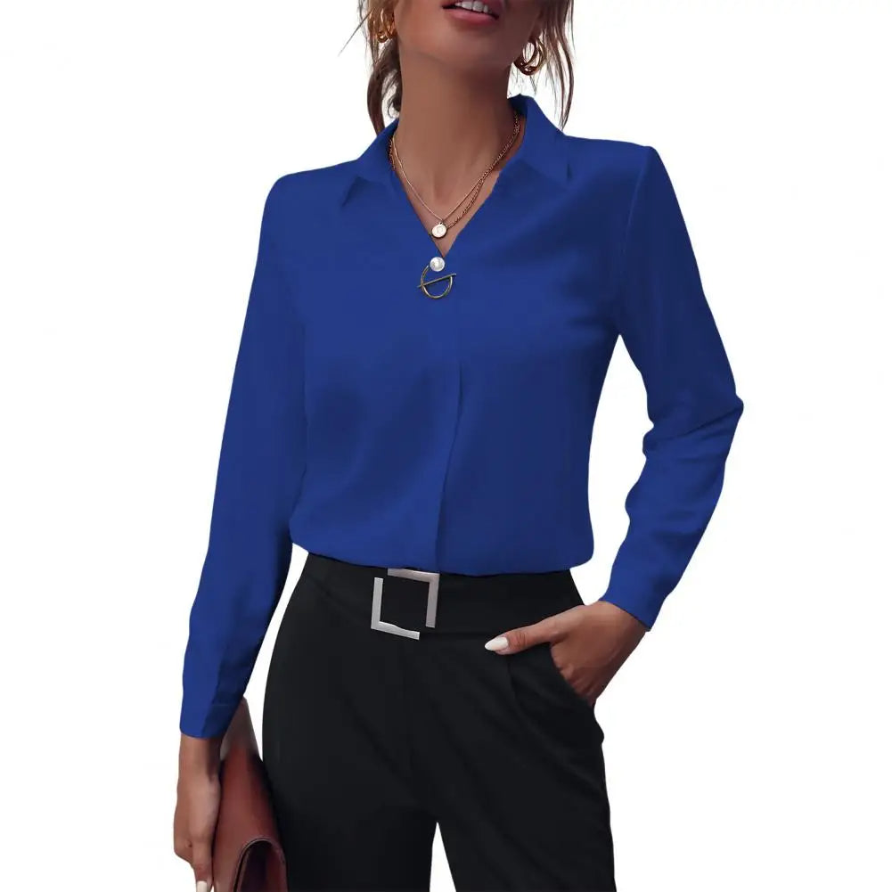 Sophisticated women's flowy long sleeve blouse. Elegant chiffon top for a polished office or casual chic style.